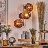 Industrielle 3-flammige Wandleuchte mit Kupfer-Glasglobus und goldenen & schwarzen Akzenten für Wohnzimmer und Schlafzimmer 