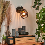 Industrielle Wandleuchte mit schwarzem Käfigschirm und goldenen Akzenten für Wohnzimmer und Schlafzimmer 