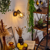 Industrielle geometrische Käfig-Wandleuchte mit schwarzen und goldenen Akzenten für Wohnzimmer und Schlafzimmer 