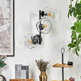 Moderne unregelmäßige Glas-Globe-Wandleuchten mit schwarzem Metallrahmen für Wohnzimmer und Schlafzimmer 