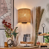 Boho gewebte Rattan-Wandleuchte in Schwarz für Wohnzimmer und Schlafzimmer, nach oben und unten leuchtend 