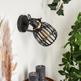 Industrielle Wandleuchte mit schwarzem Käfigschirm und goldenen Akzenten für Wohnzimmer und Schlafzimmer 