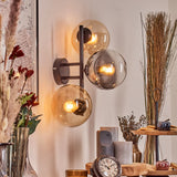 Moderne mehrflammige Glas-Wandleuchte mit schwarzem Metallrahmen für Wohnzimmer und Schlafzimmer 